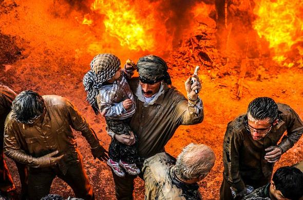 تصاویر : گل‌مالی روزعاشورا در خرم‌آباد