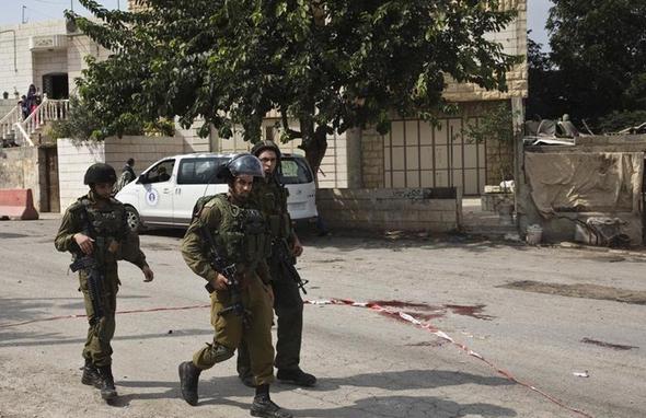 تصاویر : بی‌حرمتی به‌جسد دو جوان فلسطینی