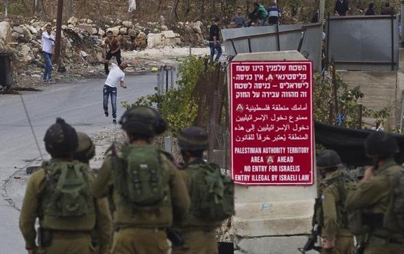 تصاویر : بی‌حرمتی به‌جسد دو جوان فلسطینی