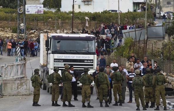 تصاویر : بی‌حرمتی به‌جسد دو جوان فلسطینی