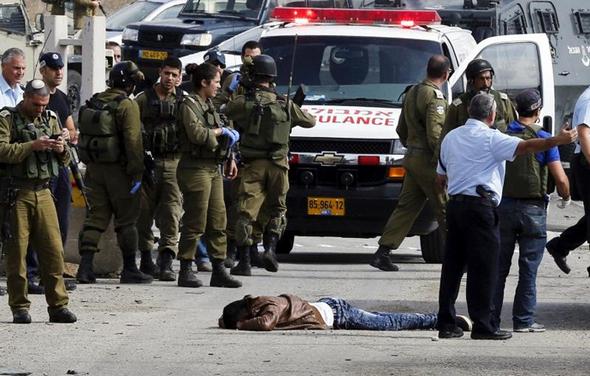 تصاویر : بی‌حرمتی به‌جسد دو جوان فلسطینی