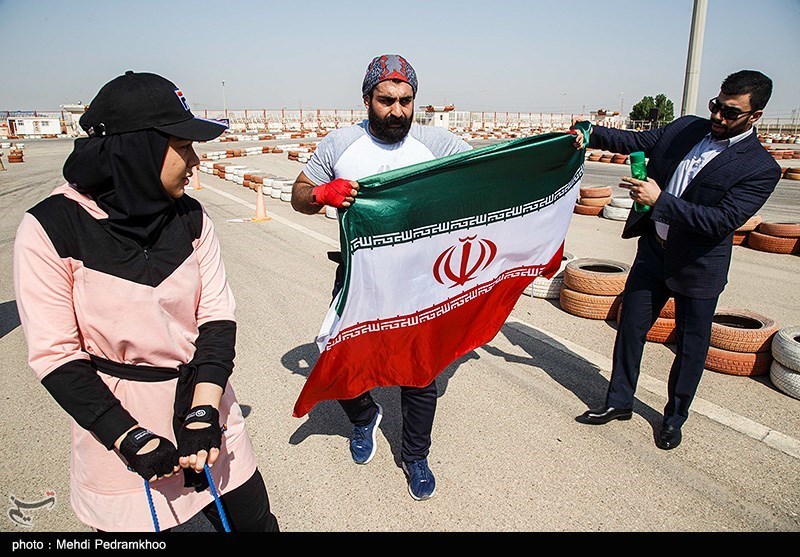 تصاویر: ثبت رکورد جهانی جابجایی کامیون با دندان توسط پوریا و فائزه سرلک