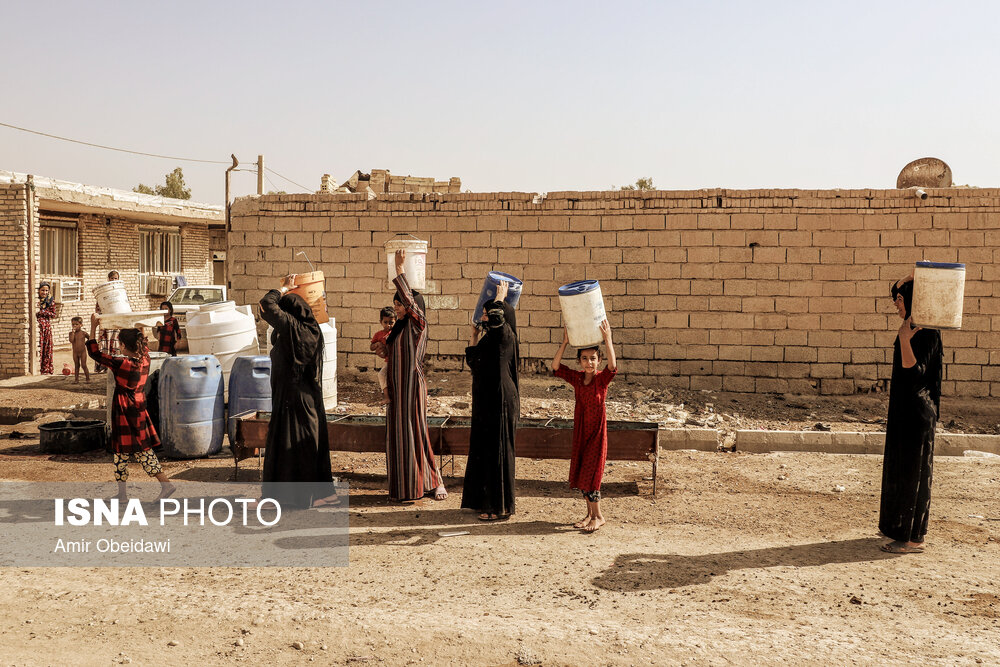 تصاویر: آبرسانی با تانکر به روستاهای درگیر تنش آبی در حمیدیه- خوزستان