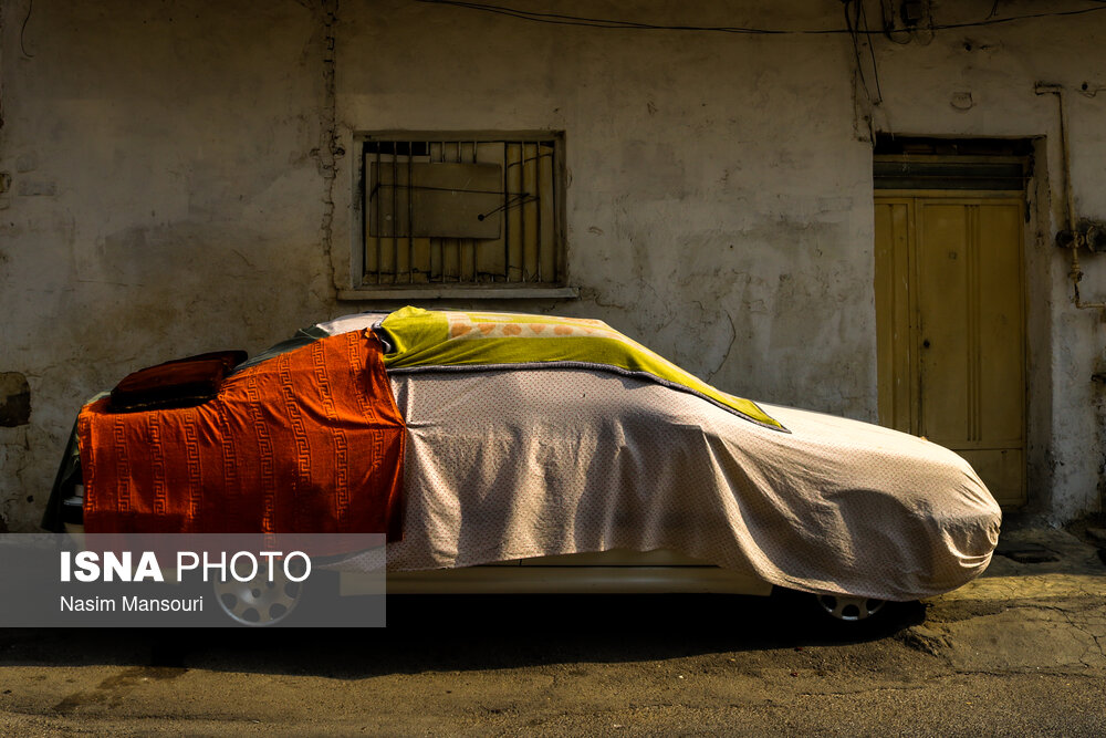 تصاویر: روپوش خودروها در گرمای خوزستان