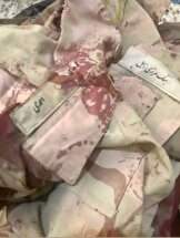 تصویری از لباس خون آلود سرباز وظیفه ای که در نبرد با طالبان شهید شد
