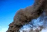 آتش‌نشانی: مشاهده دود در منطقه پونک تهران ناشی از آتش‌سوزی ضایعات چوب و لاستیک است